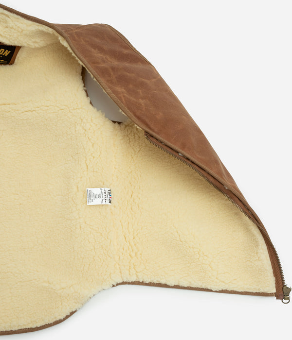Tonton et Fils - Le gilet homme « Léon » waxé camel fabriqué en France - Vue sur la doublure intérieure en mouton véritable