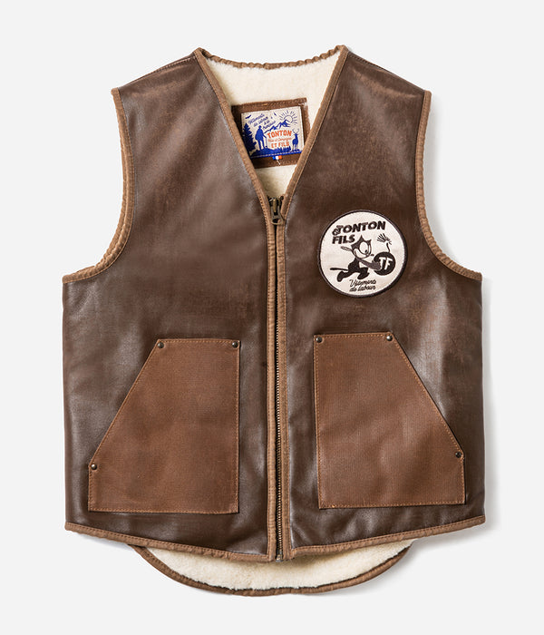 Le gilet « Félix » cuir vielli et canvas waxé camel