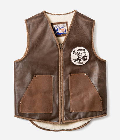 Le gilet « Félix » cuir vielli et canvas waxé camel