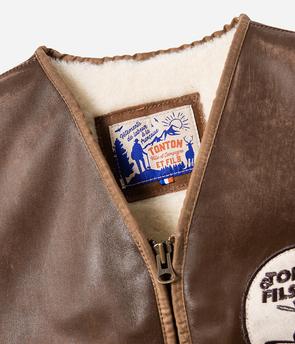 Le gilet « Félix » cuir vielli et canvas waxé camel