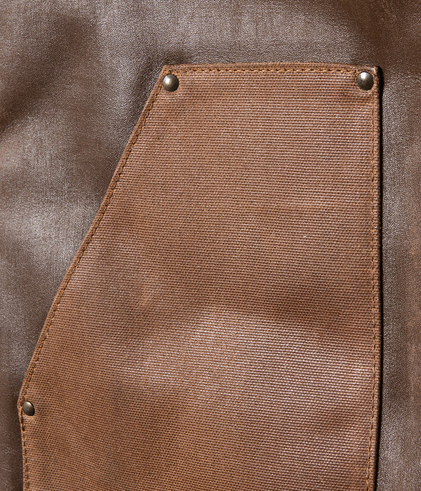 Le gilet « Félix » cuir vielli et canvas waxé camel