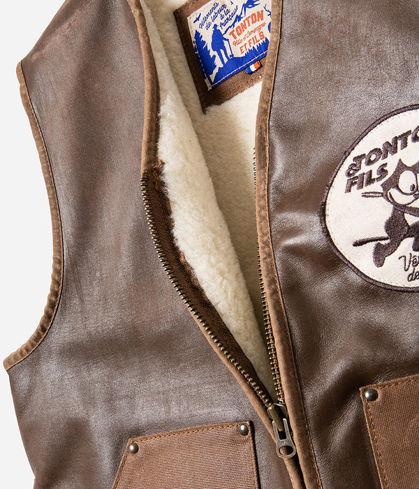 Le gilet « Félix » cuir vielli et canvas waxé camel