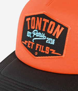 Tonton et Fils - Casquette "Trucker" - coloris Noir-Orange - Vue sur l'écusson